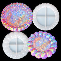 three circular objects with holographics on them, all in white and iridescent colors