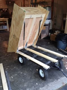 a wooden box sitting on top of a dolly