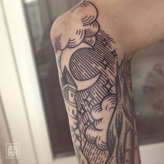 a person with a tattoo on their arm