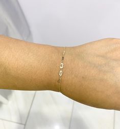 This beautiful 14k gold Number handmade bracelet would make a perfect gift for graduation, anniversary or birthday. You can personalize it to any year or numbers that mean something to you. Please let us know the numbers you want in order, on custom text Number size: 6mm Available in: 14K Yellow, White or pink gold Length: Adjustable: 61/2 to 7 inches Lock: Lobster Claw Made in New York City Chain Style: Cable, Diamond Cut Made to Order: please allow 5-10 days to process your order This bracelet Number Bracelets, Jersey Numbers, Gift For Graduation, Lobster Claws, Gold Armband, Gold Number, Handmade Bracelet, The Numbers, Diamond Cut