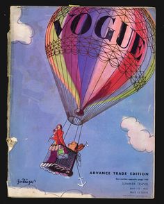 an old book cover with a woman riding on a hot air balloon