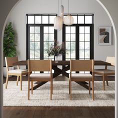 a dining room table surrounded by chairs and windows