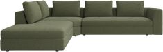 a green sectional sofa with pillows on it