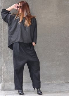 Black Linen Two Piece Outfit with Drop Crotch Pants and Wide Linen Blouse.  Wide Leg Pants Set is so comfy and easy to wear at the same time a touch of elegance and style. Handmade with care in a Pet-free and Smoke-free environment! Made of : 100% Linen The model wears size M - 5,6' / 170 cm Available Size: XS, S, M, L, XL, 2XL,3XL, and custom order. CARE Machine Wash 30oC Hand Wash with warm water Medium hot iron Tumble Low Hang to Dry for Best Results Thank you for visiting my shop. www.EUGfas Casual Relaxed Fit Pant Set With Pockets, Casual Relaxed Fit Pant Set For Work, Chic Relaxed Fit Sets With Pockets, Relaxed Fit Long Sleeve Pant Set With Pockets, Casual Sets With Pockets And Straight Pants, Casual Sets With Relaxed Fit Ankle-length Pants, Casual Pant Set With Relaxed Fit Straight Pants, Casual Cotton Pant Set With Straight Pants, Relaxed Fit Straight Pants Set For Office