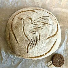 an image of a bird carved in stone