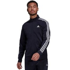 Look iconic lap after lap in this men's track jacket from adidas. Look iconic lap after lap in this men's track jacket from adidas. Moisture-wicking Lightweight warmth Zip front 2-pocket Long sleevesFIT & SIZING Relaxed fitFABRIC & CARE 100% recycled polyester Machine wash Imported Color: Dark Blue. Gender: male. Age Group: adult. Adidas Moisture-wicking Track Jacket, Adidas Moisture-wicking Sportswear Track Jacket, Adidas Sporty Track Jacket For Training, Adidas Sporty Tracksuit For Sports, Adidas Training Track Jacket, Adidas Athleisure Track Jacket With Side Stripes, Functional Track Jacket With Three Stripes For Sports Season, Athleisure Track Jacket With Three Stripes For Training, Athleisure Outerwear For Sports Events With Three Stripes