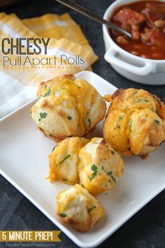 cheesy pull apart rolls on a white plate