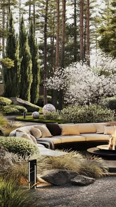 an outdoor fire pit surrounded by trees and bushes