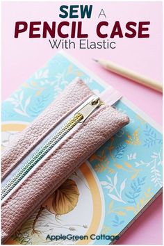 a pink purse with the words sew a pencil case with elastic