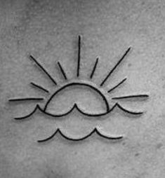 a sun and cloud tattoo on the chest