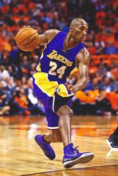 a basketball player dribbling the ball during a game