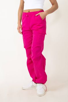 Stand out from the crowd in these fashionable Love Tree Nylon Cargo Baggy Parachute Pants for Women in Pink! The lightweight and durable nylon material provides comfort and functionality, while the vibrant magenta color adds a touch of fun to your wardrobe. Be confident and stylish in these statement pants!Features:Love TreeStyle: 6866PN-MAGENTAColor: Pink 100% NylonWomen’s pantsOne cargo side pocketHand side pockets Elastic waistbandMoisture wickingSoft lite material Drawstring waistband and ankle hem Measurements from size small:Waist: 26” Front Rise: 11” Back rise: 13” Inseam: 31"Machine wash cold, line dry Baggy Parachute Pants, Statement Pants, Magenta Color, Love Tree, Small Waist, Drawstring Waistband, Side Pocket, Boutique Clothing, Parachute Pants