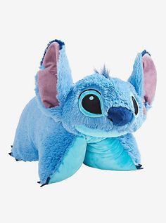 the stuffed animal is blue and has ears that look like an elephant's head