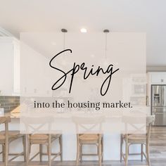 the words spring into the housing market are in front of an open kitchen and dining area