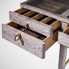 a wooden table with two drawers and one drawer open to show the contents on it