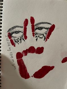 a drawing of a woman's face with her hand painted red and black on it