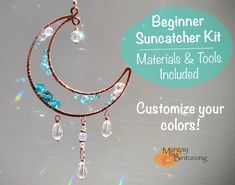 an advertisement for a jewelry making kit featuring the moon and crystal beads hanging from it's side