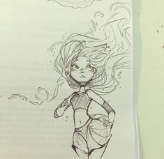 a drawing of a girl with her hair blowing in the wind, next to an open book