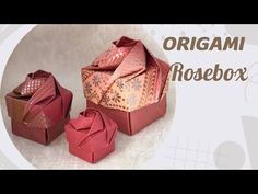 an origami rosebox is shown in red