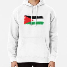 a man wearing a white hoodie with the flag of jordan painted on it