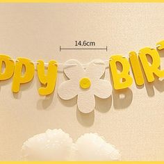 a happy birthday banner with flowers on it