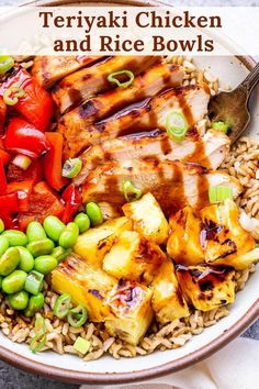 a bowl filled with meat, vegetables and rice