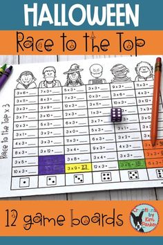 halloween race to the top game board with pencils and crayons on it