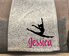 a personalized towel with a silhouette of a girl on the front and back of it