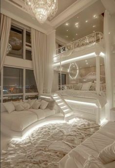 a bedroom with white furniture and lights on the ceiling