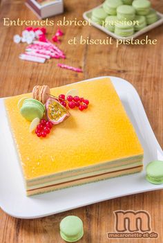 a yellow cake sitting on top of a white plate