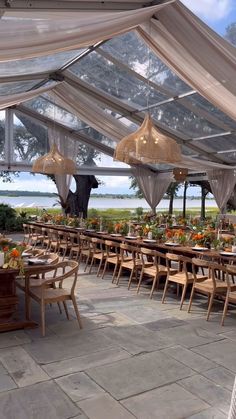 an outdoor dining area with tables and chairs