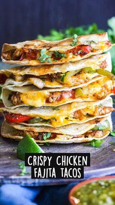 crispy chicken fajita tacos stacked on top of each other