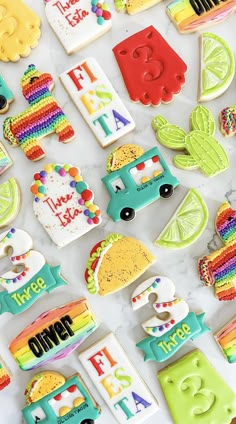 decorated cookies are laid out on a table