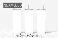 three white tumblers with straws in them