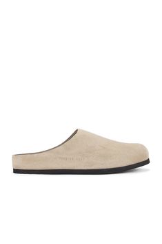 Suede upper with rubber sole.  Made in Italy.  Slip-on styling.  Contoured suede footbed with leather lining.  .  .  .  .  .  .  .  .  .  .  .  . Gray Sneakers, Perfect Sneakers, Ugly Shoes, Minimalist Shoes, Common Projects, Grey Sneakers, The Line, Low Top, Sneakers Fashion