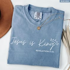 Proclaim your faith boldly with our 'Jesus is King' shirt, inspired by Revelation 17:14: 'For He is Lord of lords and King of kings.'  This Comfort Colors tee combines style and meaning, making it perfect religious apparel for any occasion. Whether as a Jesus merch gift or a personal statement of faith, this Christianity Jesus shirt offers a comfortable fit and inspirational message. Ideal for believers seeking a Bible verse t-shirt, Christian shirt, or Jesus tee to share their devotion in a modern, stylish way. If you're looking for a thick, structured tee that's also super soft and breathable--look no further! The unisex garment-dyed heavyweight t-shirt ticks all the boxes and is made of 100% ring-spun cotton. The regular t-shirt style will complement most looks and fit you to a tee. * 1 Bible Tshirts, Jesus Is King Shirt, Christian Wear, Jesus Merch, Modest Christian Clothing, Christian Outfits, Revelation 17, Christian Tee Shirts, Jesus Clothes