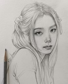 a pencil drawing of a girl with long hair