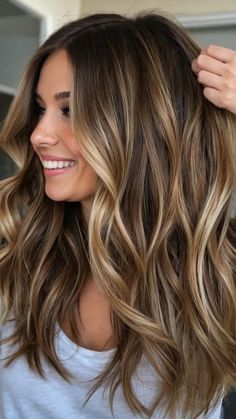 Elevate Your Look: 15 Trendy Balayage Hairstyle Ideas for Brunettes - pulsepathlife.com Long Hair Caramel Balayage, Brown Caramel Hair Balayage, Butterscotch Highlights On Dark Hair, Long Hair Going Out Hairstyles, Balayage Hair Low Maintenance, Bronde Caramel Balayage, Balayage Hair Brown Caramel, Low Maintenance Fall Hair, Caramel Money Piece Hair On Dark Hair