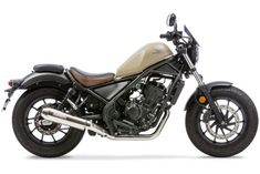 a black and tan motorcycle on a white background