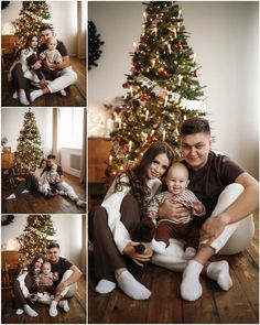 a man and woman are sitting in front of a christmas tree with their baby boy