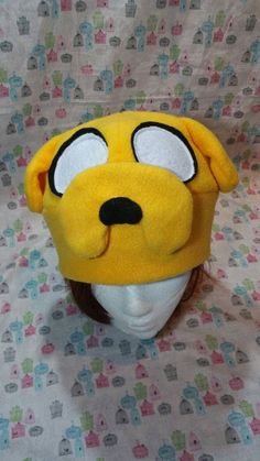 Adventure Time Jake the Dog Inspired Fleece Hat Handmade Halloween Cosplay Beanie Hat, Adjustable Beanie Hat For Cosplay, Adjustable Beanie For Cosplay, Fun Halloween Cosplay Hat, Playful Costume Hats And Headpieces For Halloween Cosplay, Playful Halloween Costume Hats And Headpieces For Cosplay, Playful Halloween Cosplay Costume Hats And Headpieces, Novelty Beanie Hat For Cosplay, Novelty Beanie For Cosplay