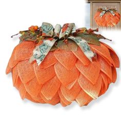 an orange mesh pumpkin with leaves and bows on it's head is shown in front of a white background