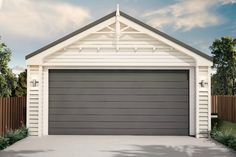 a white house with a gray garage door