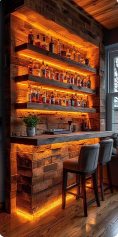 a wooden bar with lighted shelves and stools