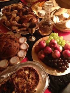 a table topped with lots of different types of food