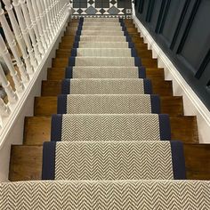 an image of a staircase with carpeted steps