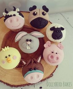 cupcakes made to look like farm animals