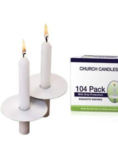 two white candles sitting on top of each other next to a pack of bandages and a box