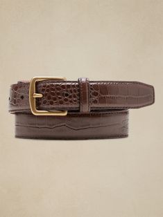 Sleek and streamlined, this embossed leather belt adds a bit of variety to your wardrobe.  LEATHER WORKING GROUP: By purchasing this product, you are supporting responsible leather manufacturing through the Leather Working Group.  Width: 1" (2. 5cm) Crocodile Belt, Money Belt, Buy List, Digital Closet, Designer Belts, Cocoa Brown, Belt Style, Dress Belt, Brown Leather Belt