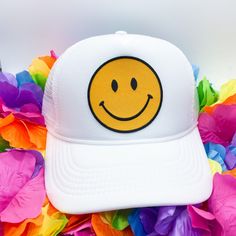 Keep it trendy with this new smiley face patch trucker hat! A best-seller, these hats are adjustable and can fit just about any head. They're super comfortable too. The smiley face patch is sure to keep you smiling all day long! **Please note: Due to high demand, MOST colors will take 3-4 weeks to ship! We apologize for any inconvenience, but until we can get more hats in, this is the allotted time necessary to produce these Fun White Trucker Hat With Curved Brim, Fun White Trucker Hat With Flat Brim, White Fun Trucker Hat With Flat Brim, Fun Snapback Hat For Streetwear, White Novelty Snapback Hat With Curved Brim, Fun White Baseball Cap For Streetwear, Fun White Snapback Hat, Fun Trucker Hat For Streetwear, Fun White 5-panel Hat